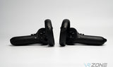 HTC Vive XR Elite controllers in a grey background for sale at VR Zone in Adelaide Australia